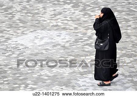 Stock Photography - Hong Kong: a Muslim woman in Tsim Sha Tsui. Fotosearch