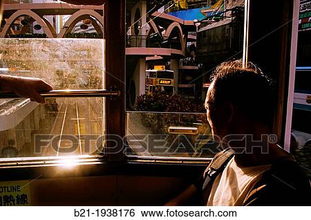 Hong Kong- Doble deck tramways at Wan Chai district, Hong Kong. View Large Photo Image Stock Photograph - Hong Kong- Doble deck tramways at Wan Chai district, Hong Kong.. Fotosearch