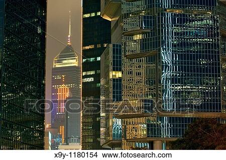Hong Kong Island, China Central Plaza tower with spire, seen through city centre skyscraper facades, is 374m 78 floors high View Large Photo Image Picture - Hong Kong Island, China Central Plaza tower with spire, seen through city centre skyscraper facades, is 374m 78 floors high. Fotosearch