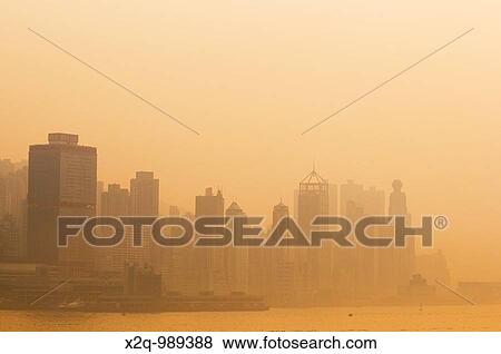 Hong Kong skyline shrouded in pollution and smog View Large Photo Image Stock Photo - Hong Kong skyline shrouded in pollution and smog. Fotosearch