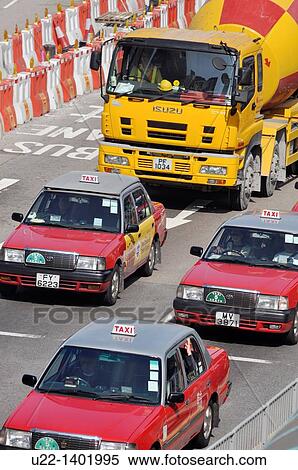 Stock Photography - Hong Kong: taxis and truck in Central. Fotosearch