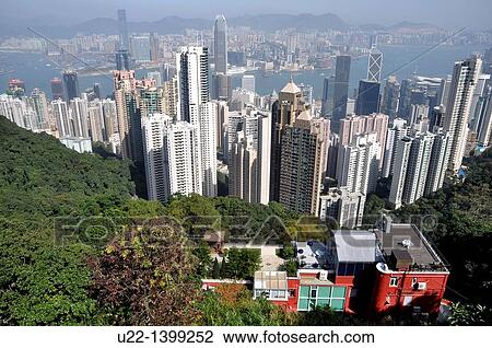 Stock Image - Hong Kong: view of the city and of Victoria Harbour from Victoria Peak. Fotosearch