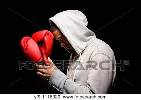 Hooded young man boxer. View Large Photo Image Stock Image - Hooded young man boxer.. Fotosearch