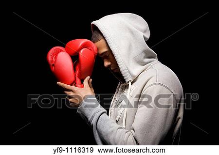 Hooded young man boxer. View Large Photo Image Stock Photo - Hooded young man boxer.. Fotosearch