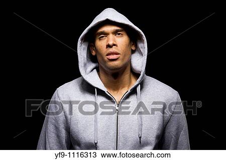 Hooded young man. View Large Photo Image Stock Image - Hooded young man.. Fotosearch