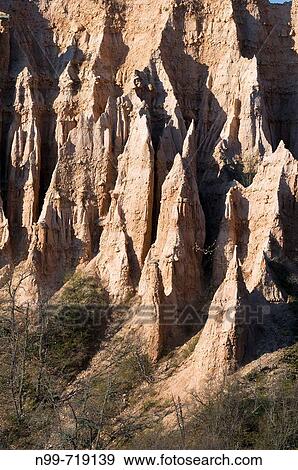 Hoodoo rocks of Melnik, geologic formations of soft sedimentary rocks, arid landscape, South Bulgaria View Large Photo Image Stock Photo - Hoodoo rocks of Melnik, geologic formations of soft sedimentary rocks, arid landscape, South Bulgaria. Fotosearch