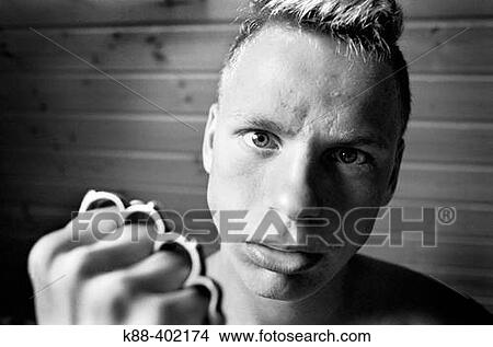 Hooligan with knuckle duster, Sweden View Large Photo Image Picture - Hooligan with knuckle duster, Sweden. Fotosearch