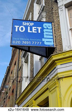 hop to Let sign above commercial premises View Large Photo Image Stock Photo - hop to Let sign above commercial premises. Fotosearch