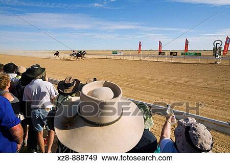 Horse racing in the outback at the annual Birdsville Cup Races Every September the small town holds the most famous bush racing carnival in Australia Birdsville, Queensland, Australia View Large Photo Image Stock Photo - Horse racing in the outback at the annual Birdsville Cup Races Every September the small town holds the most famous bush racing carnival in Australia Birdsville, Queensland, Australia. Fotosearch