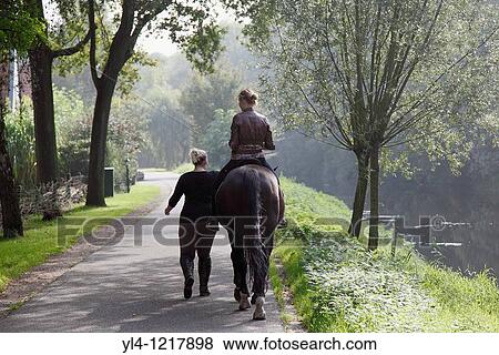 Stock Photo - Horse riding. Leusden, Utrecht province, Netherlands. Fotosearch