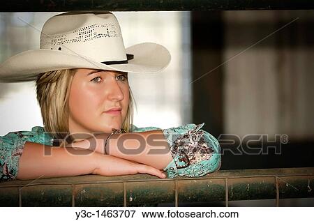 Horseback riding cowgirl View Large Photo Image Stock Photo - Horseback riding cowgirl. Fotosearch