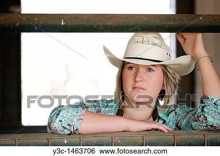 Horseback riding cowgirl View Large Photo Image Stock Photograph - Horseback riding cowgirl. Fotosearch
