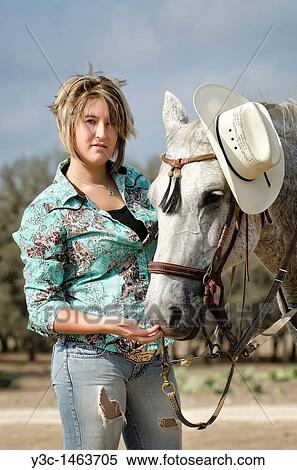 Horseback riding cowgirl View Large Photo Image Stock Photography - Horseback riding cowgirl. Fotosearch
