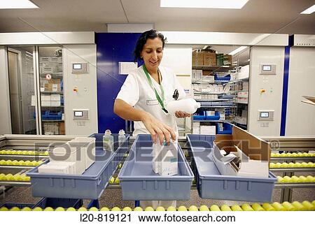 Hospital pharmacy, automated storage system. Hospital Universitario de Gran Canaria Doctor Negrin, Las Palmas de Gran Canaria. Canary Islands, Spain View Large Photo Image Stock Image - Hospital pharmacy, automated storage system. Hospital Universitario de Gran Canaria Doctor Negrin, Las Palmas de Gran Canaria. Canary Islands, Spain. Fotosearch