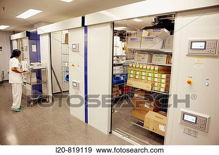 Hospital pharmacy, automated storage system. Hospital Universitario de Gran Canaria Doctor Negrin, Las Palmas de Gran Canaria. Canary Islands, Spain View Large Photo Image Stock Photo - Hospital pharmacy, automated storage system. Hospital Universitario de Gran Canaria Doctor Negrin, Las Palmas de Gran Canaria. Canary Islands, Spain. Fotosearch