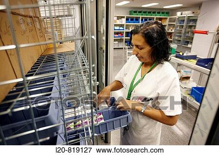 Hospital pharmacy, automated storage system. Hospital Universitario de Gran Canaria Doctor Negrin, Las Palmas de Gran Canaria. Canary Islands, Spain View Large Photo Image Stock Photo - Hospital pharmacy, automated storage system. Hospital Universitario de Gran Canaria Doctor Negrin, Las Palmas de Gran Canaria. Canary Islands, Spain. Fotosearch