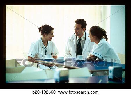 Hospital staff, chatting at the cafeteria View Large Photo Image Stock Image - Hospital staff, chatting at the cafeteria. Fotosearch