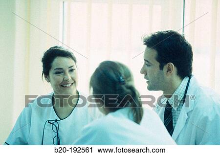 Hospital staff, chatting at the cafeteria View Large Photo Image Stock Image - Hospital staff, chatting at the cafeteria. Fotosearch