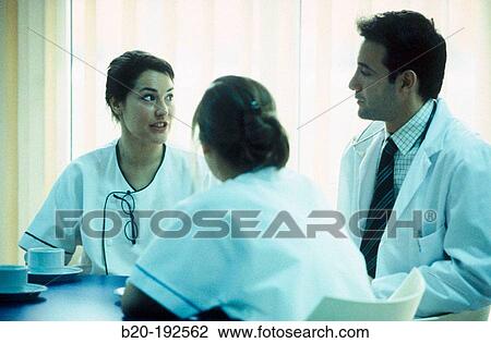 Hospital staff, chatting at the cafeteria View Large Photo Image Stock Image - Hospital staff, chatting at the cafeteria. Fotosearch