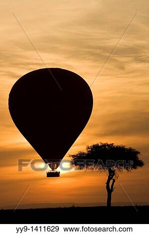 Stock Photo - Hot Air Balloon over the Masai Mara National Reserve, Kenya. Fotosearch