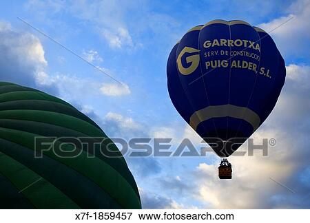 Hot air balloons in Garrotxa Natural Park, Girona province Catalonia Spain View Large Photo Image Stock Photo - Hot air balloons in Garrotxa Natural Park, Girona province Catalonia Spain. Fotosearch