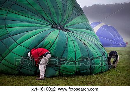 Hot air balloons preparing for flight over Garrotxa Natural Park, Girona province Catalonia Spain View Large Photo Image Stock Image - Hot air balloons preparing for flight over Garrotxa Natural Park, Girona province Catalonia Spain. Fotosearch