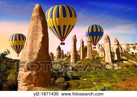 Hot Air Baloons over the Love Valley at sunrise, Cappadocia Turkey View Large Photo Image Stock Image - Hot Air Baloons over the Love Valley at sunrise, Cappadocia Turkey. Fotosearch