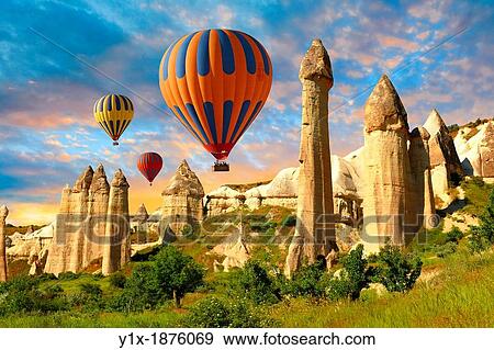 Hot Air Baloons over the Love Valley at sunrise, Cappadocia Turkey View Large Photo Image Stock Photo - Hot Air Baloons over the Love Valley at sunrise, Cappadocia Turkey. Fotosearch
