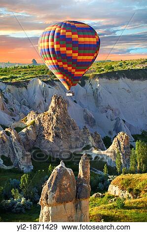 Hot Air Baloons over the Love Valley at sunrise, Cappadocia Turkey View Large Photo Image Stock Photo - Hot Air Baloons over the Love Valley at sunrise, Cappadocia Turkey. Fotosearch