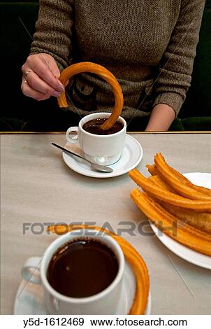 hot chocolate with churros in chocolateria, Madrid, Spain, Europe View Large Photo Image Stock Photo - hot chocolate with churros in chocolateria, Madrid, Spain, Europe. Fotosearch