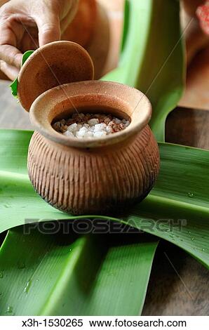 Hot salt clay pot for compress, Ayatthuya Garden River Home, Wellness and Organic Resort, Thailand, Asia View Large Photo Image Stock Photography - Hot salt clay pot for compress, Ayatthuya Garden River Home, Wellness and Organic Resort, Thailand, Asia. Fotosearch