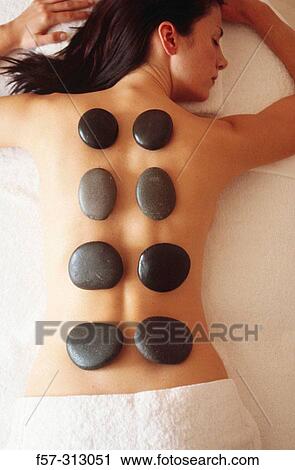 hot stone therapy View Large Photo Image Stock Image - hot stone therapy. Fotosearch
