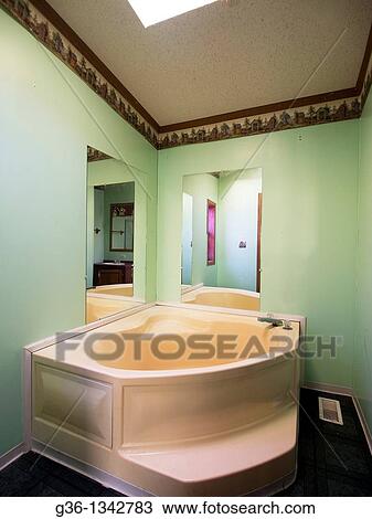 Hot tub in a foreclosed home in Interlochen, Michigan, United States View Large Photo Image Stock Image - Hot tub in a foreclosed home in Interlochen, Michigan, United States. Fotosearch
