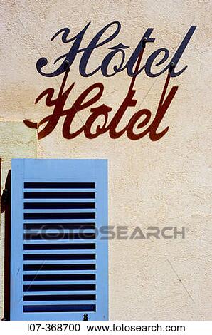 Hotel sign and blue shutter. Cassis. Riviera. France View Large Photo Image Stock Image - Hotel sign and blue shutter. Cassis. Riviera. France. Fotosearch