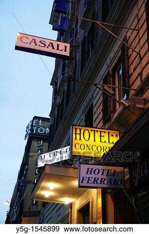 hotel signs at night in the termini district rome italy View Large Photo Image Stock Photo - hotel signs at night in the termini district rome italy. Fotosearch