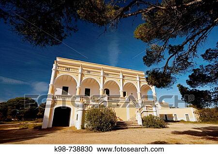 House (19th century) by Cala Macarella, Ciutadella. Minorca, Balearic Islands, Spain View Large Photo Image Stock Image - House (19th century) by Cala Macarella, Ciutadella. Minorca, Balearic Islands, Spain. Fotosearch