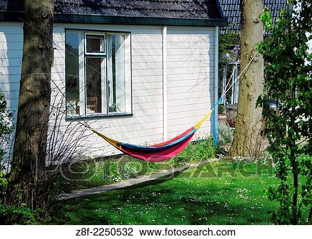 Stock Image - House at Amtel River in Amsterdam.. Fotosearch