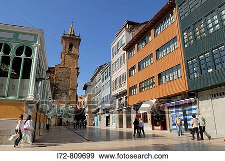 Stock Photo - House fa? ades in front of the Fontan market and church of San Isidoro el Real in background, Oviedo. Asturias, Spain. Fotosearch