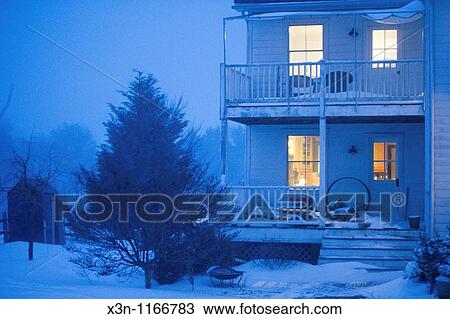 House in snow at night View Large Photo Image Stock Image - House in snow at night. Fotosearch