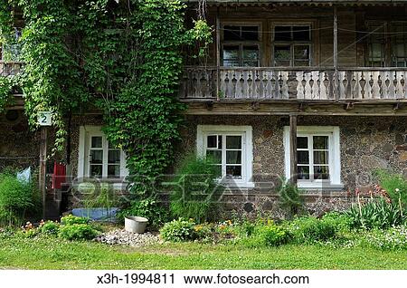 Stock Image - house in the village Krimulda, around Sigulda, Gauja National park, Vidzeme Region, Latvia, Baltic region, Northern Europe.. Fotosearch