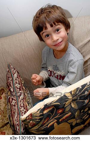 House interior child pretending to drive game View Large Photo Image Stock Image - House interior child pretending to drive game. Fotosearch