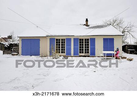 Stock Photo - house under snow, Senantes, Eure-et-Loir department, Centre region, France, Europe.. Fotosearch