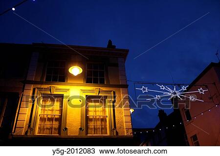 house with christmas lights at night in caernarfon wales great britain uk View Large Photo Image Stock Image - house with christmas lights at night in caernarfon wales great britain uk. Fotosearch
