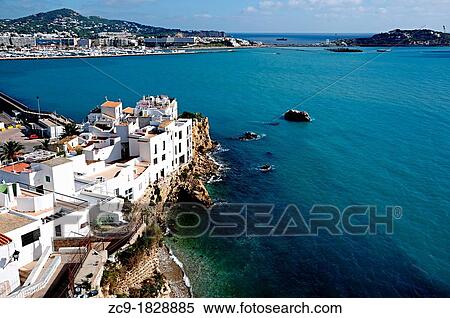 Houses perched on rocks in Sa Pea neighborhood Ibiza town, Balearic Islands, Spain View Large Photo Image Stock Photography - Houses perched on rocks in Sa Pea neighborhood Ibiza town, Balearic Islands, Spain. Fotosearch
