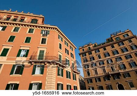 housing buildings against the blue sky, Rome, Italy View Large Photo Image Stock Photograph - housing buildings against the blue sky, Rome, Italy. Fotosearch