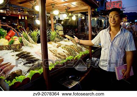 Hua Hin Night Market - Apart from its role as a convenient beach town to Bangkok, Hua Hin is a favourite spot for seafood and seaside dining along the wharf. View Large Photo Image Picture - Hua Hin Night Market - Apart from its role as a convenient beach town to Bangkok, Hua Hin is a favourite spot for seafood and seaside dining along the wharf.. Fotosearch