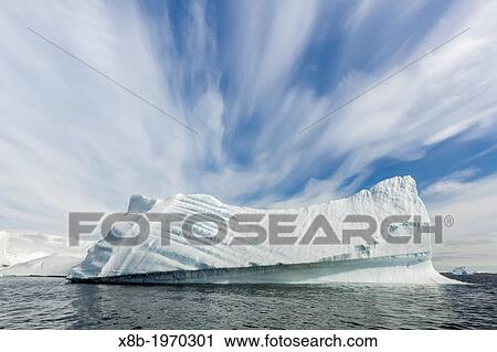 Huge Iceberg near Pleneau Island, western side of the Antarctic Peninsula, Southern Ocean. View Large Photo Image Stock Image - Huge Iceberg near Pleneau Island, western side of the Antarctic Peninsula, Southern Ocean.. Fotosearch