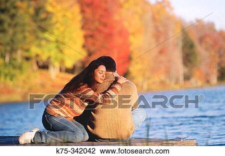 Hugging on the dock View Large Photo Image Stock Image - Hugging on the dock. Fotosearch