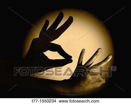 Picture - Human Hand with Shadow. Fotosearch