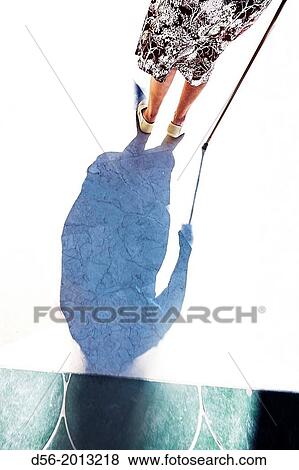 Human shadow, Benidorm, Alicante province, Spain. View Large Photo Image Stock Photo - Human shadow, Benidorm, Alicante province, Spain.. Fotosearch